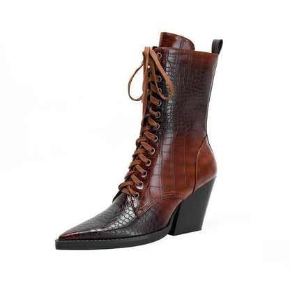 Dark brown women's ankle boots with a chunky heel, pointed toe, side zipper, and a retro stone pattern on the microfiber upper.