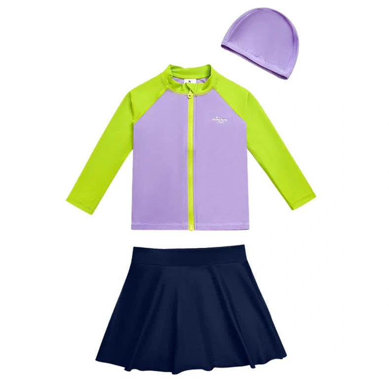 Girls' long sleeve swimsuit with split skirt in gradually varied pink colour, showing complete arm coverage and skirt design