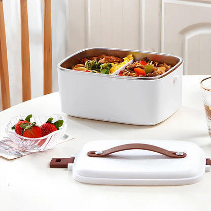 White car heating lunch box with stainless steel interior showing power cords and utensils