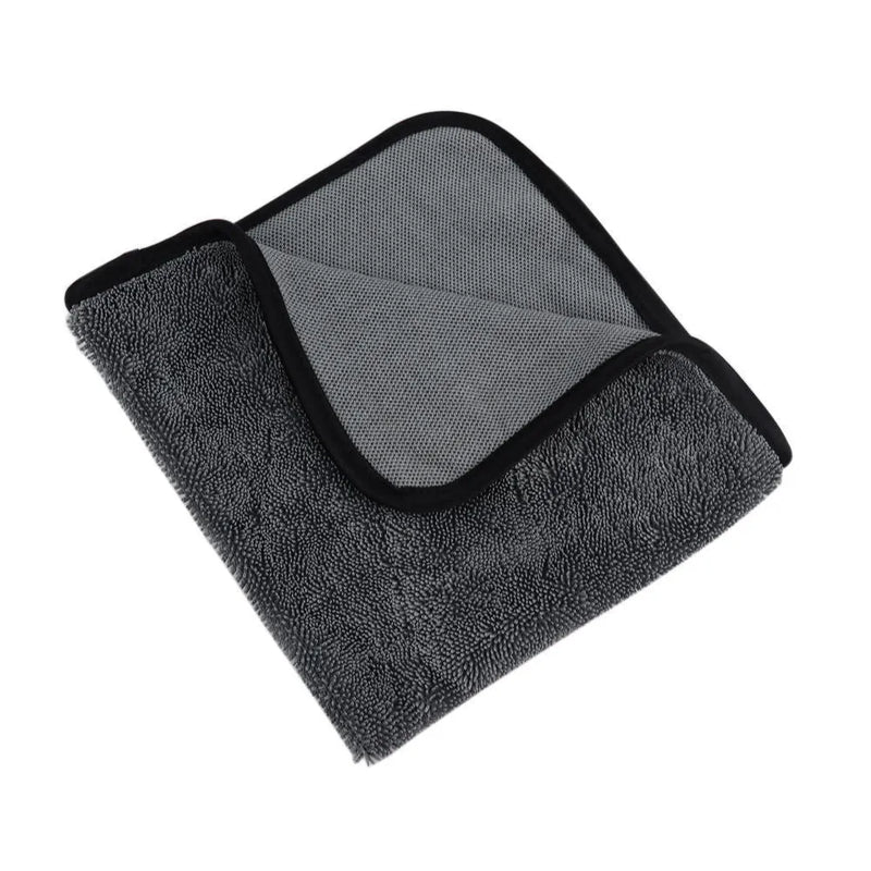 Car wash towel in grey microfiber measuring 40x40cm with strong water absorption for cleaning vehicles, windows, and household surfaces. Packaged in single units or multi-packs.