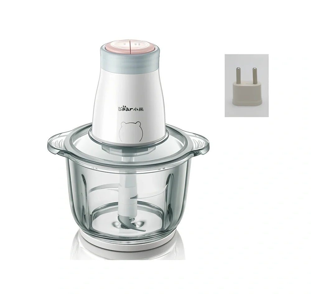 Household electric vegetable chopper blender with glass bowl and stainless steel blade on kitchen counter