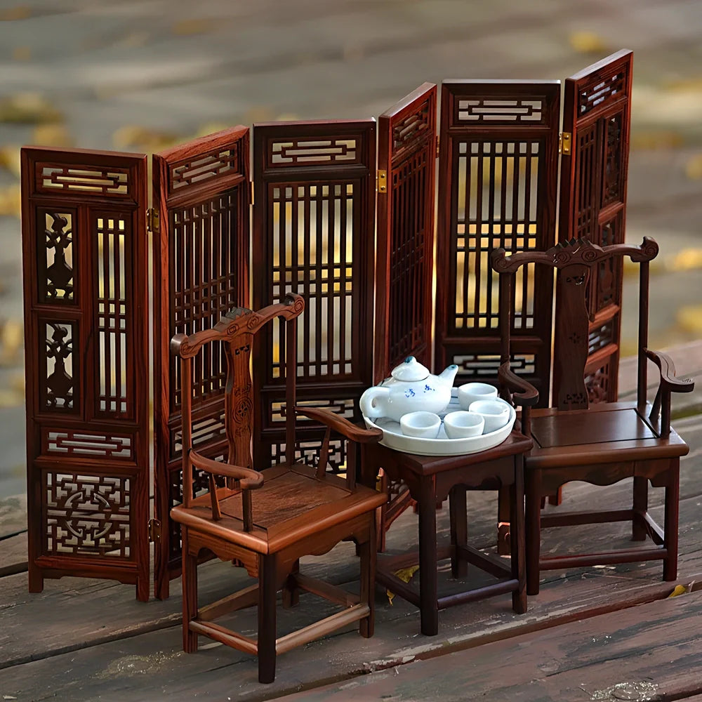 Red rosewood miniature Chinese furniture model with traditional carved details and mahogany construction