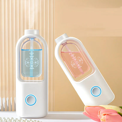 White columnar wireless aromatherapy machine with automatic deodorant function and wall bracket
