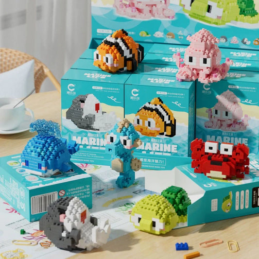 Marine small creature building blocks set showing 12 different sea animal models in colour box packaging