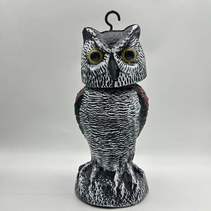 Set of artificial owl bait ornaments with shaking heads for scaring birds outdoors.