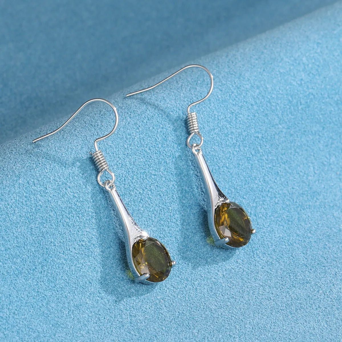 Olive green topaz earrings with water drop shape measuring 2.5 cm, electroplated alloy construction