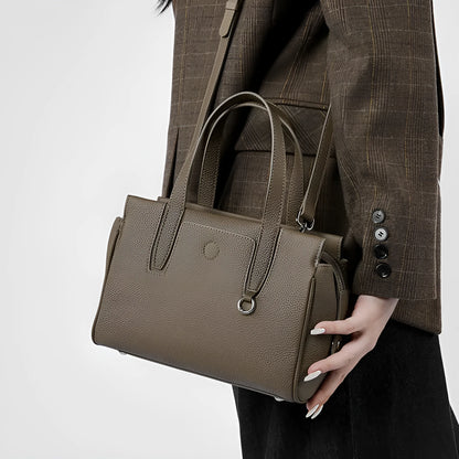Genuine leather crossbody bag with square shape and adjustable shoulder strap