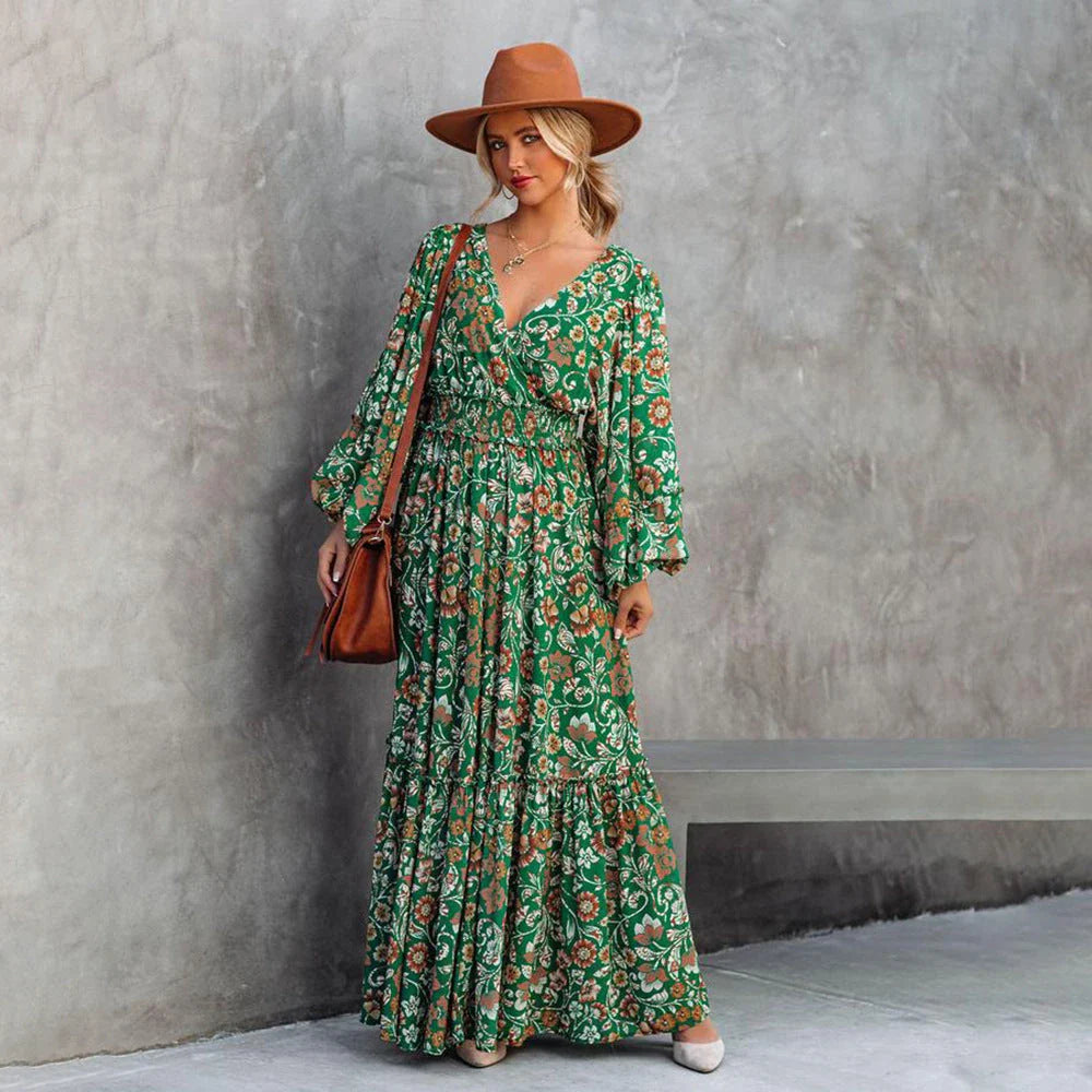 A green halter dress with a vibrant printed pattern and lantern sleeves.