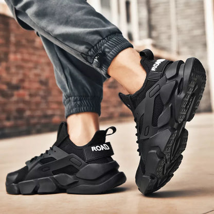 Breathable mesh casual shoes in white and black with thick rubber soles