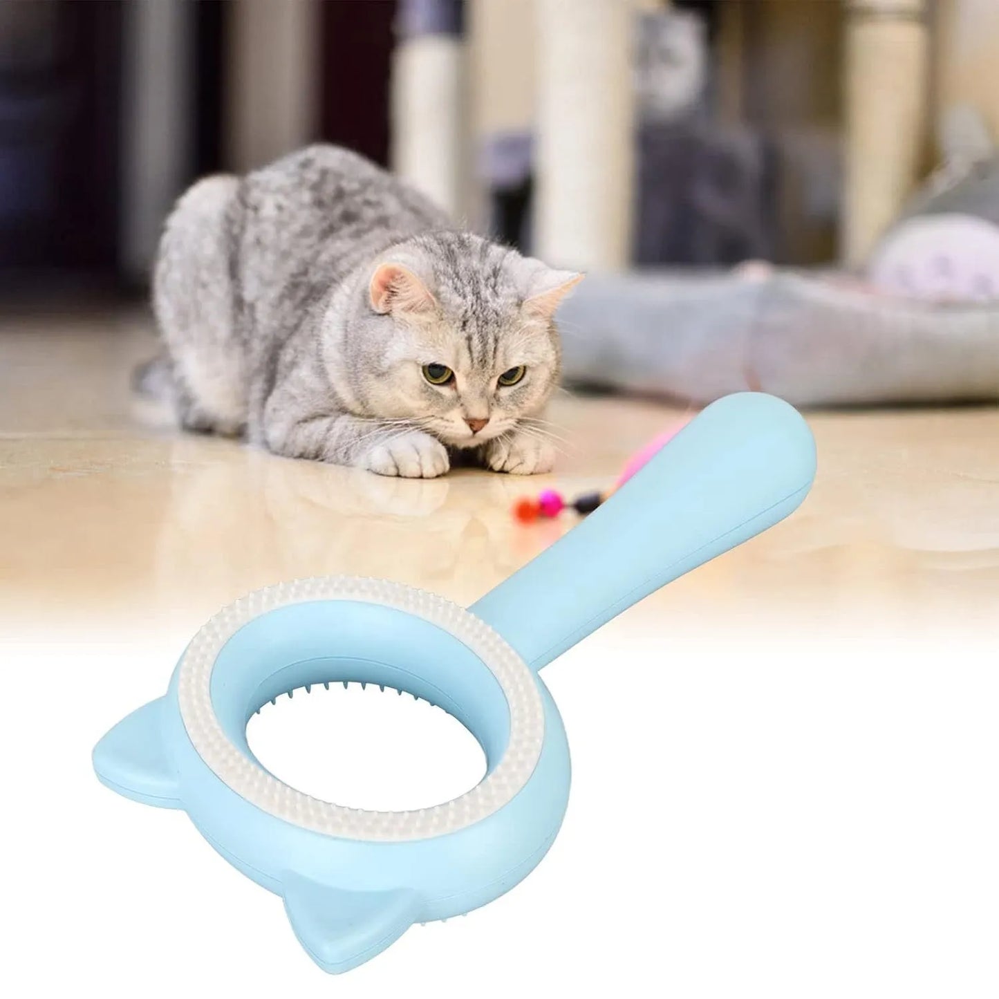 Blue and white dual-sided pet grooming brush with an ergonomic handle for cats and dogs.