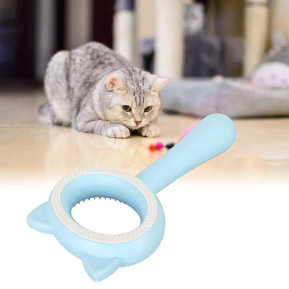 Blue and white dual-sided pet grooming brush with an ergonomic handle for cats and dogs.