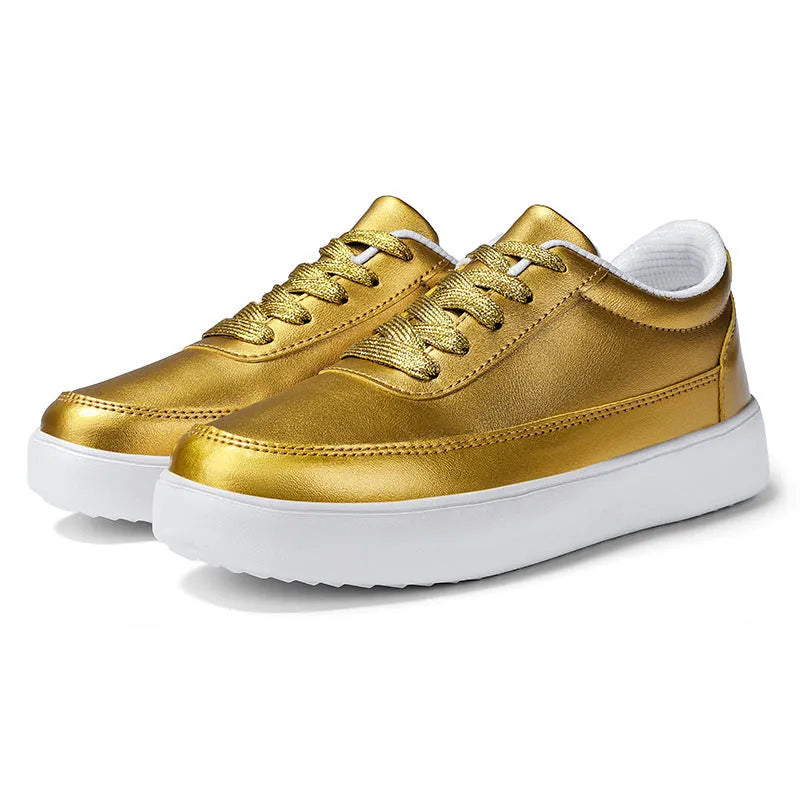 Women's lightweight leather flat casual shoes in gold colour with front lace-up design on a white background