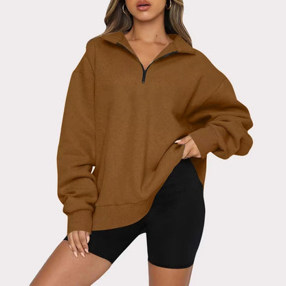 Women's zip turndown collar sweatshirt in various colors, showcasing loose fit and zipper detail.