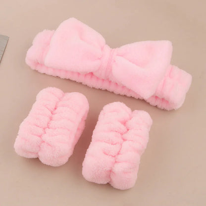 Facial brush set with coral fleece hair band and 4-count nylon brush heads in purple, gray, white, pink colours