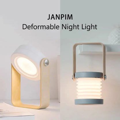 White foldable USB rechargeable LED night light in both table lamp and tall lantern modes.