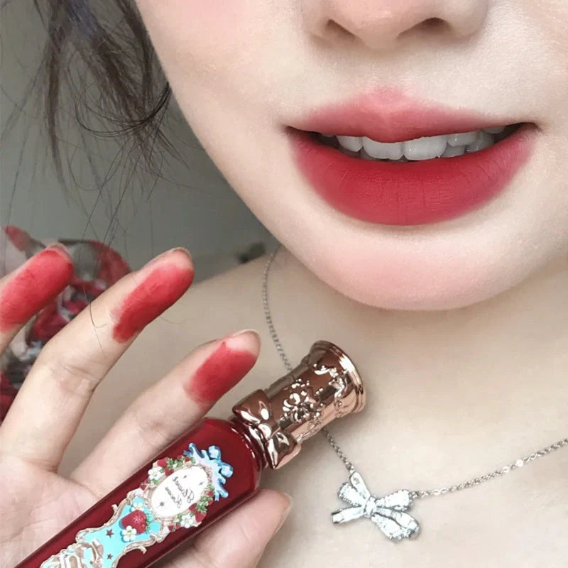 Flower Knows Strawberry Rococo Series Embossed Blush Velvet Matte Lip Glaze in retro perfume bottle design