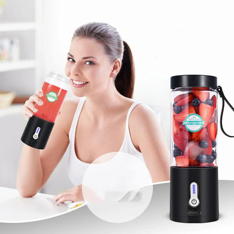Hand operated portable blender in black, white, blue, and rose red with rechargeable battery and 530ml capacity