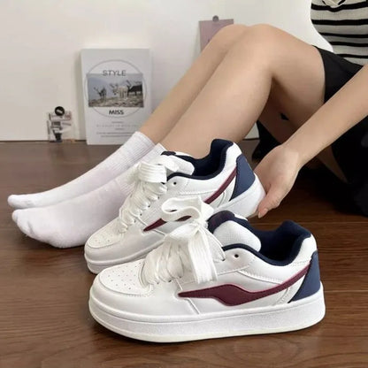 Women's low top board shoes in solid pink, white yellow, white black, or white red with mid heel and rubber sole