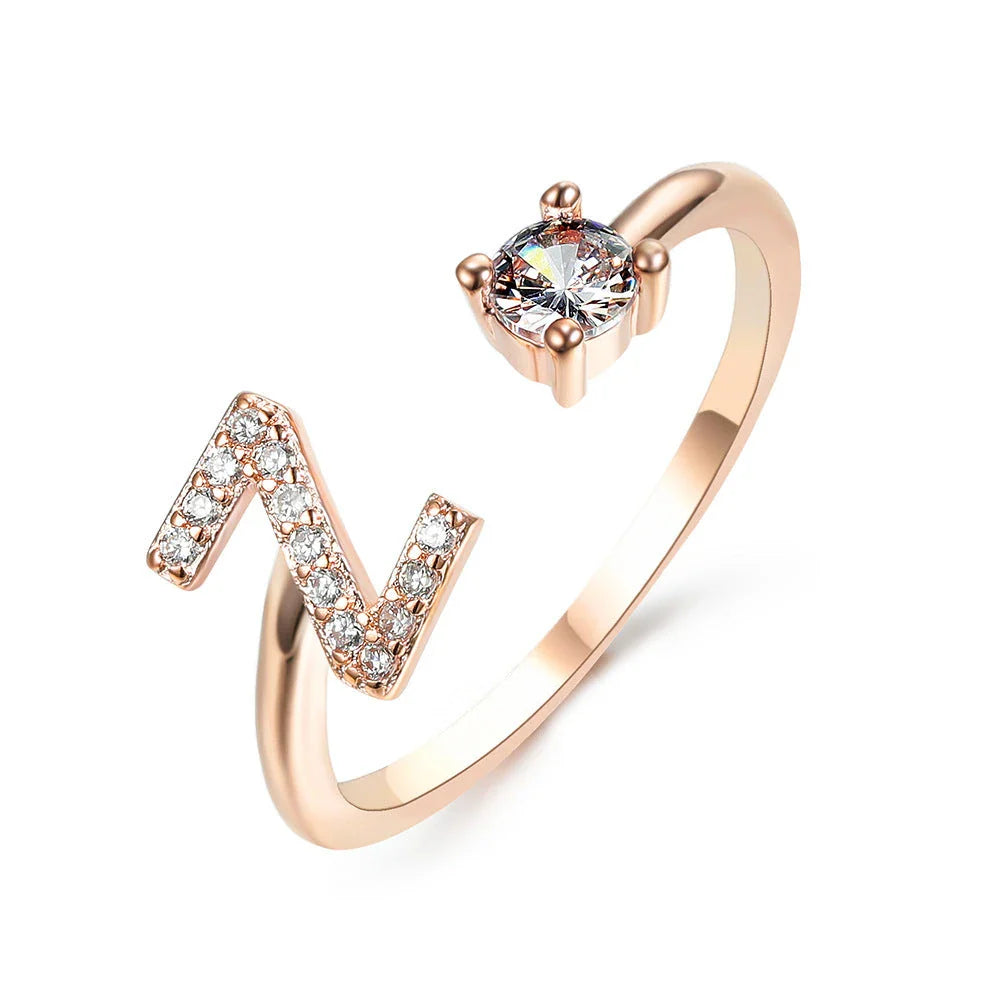 Personalized Initial Letter Adjustable Ring made of copper alloy and zircon, showcasing a vintage-inspired design