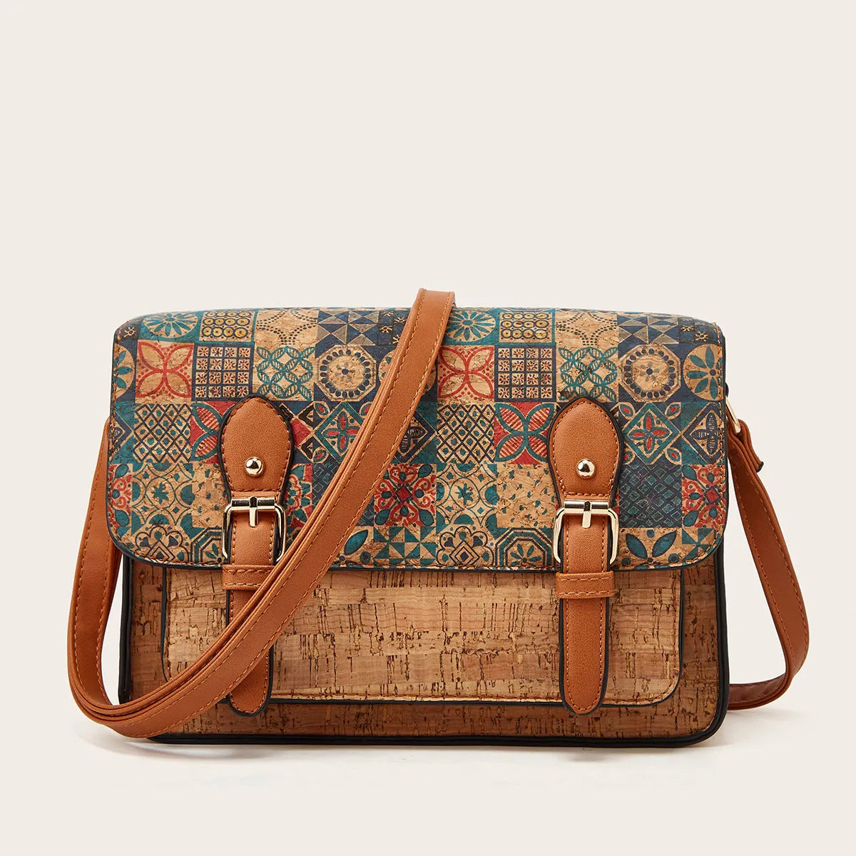 Women's one-shoulder crossbody bag with printed design in green colour, showing large capacity and single strap.