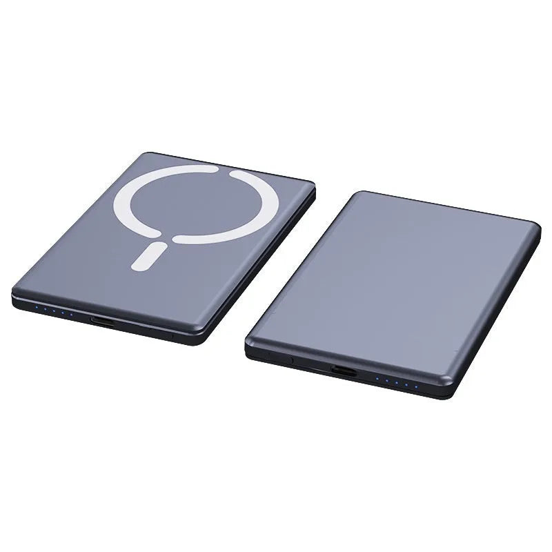 Slim dark grey magnetic power bank attached to the back of an iPhone, showing its thin 9mm profile.
