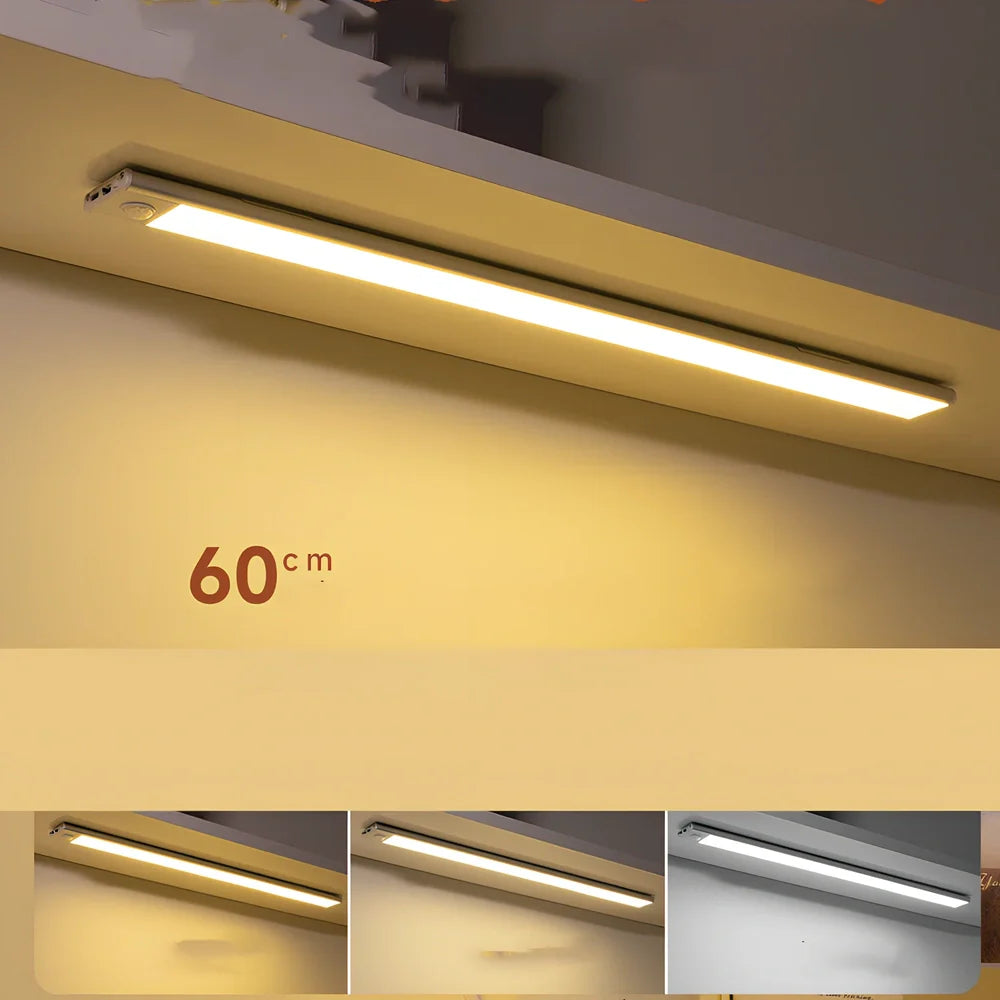 Silver LED inductive light strip, 40cm length, attached to shoe cabinet shelf with 3M adhesive