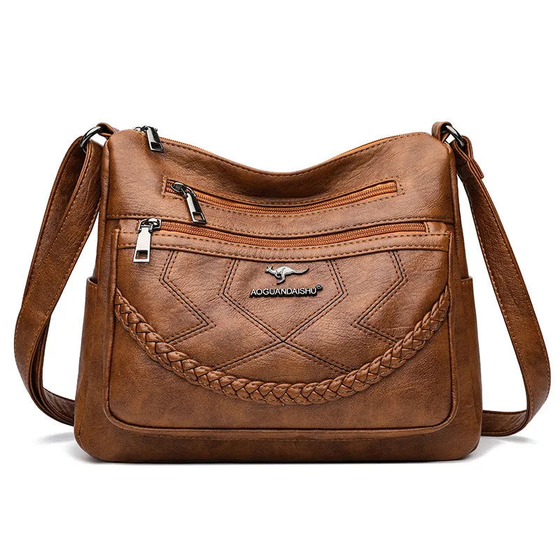 Soft leather fashion shoulder bag in horizontal square design with multiple internal pockets