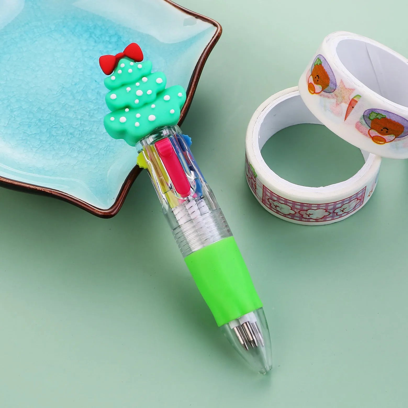 Christmas four-colour ballpoint pen with press mechanism showing festive designs