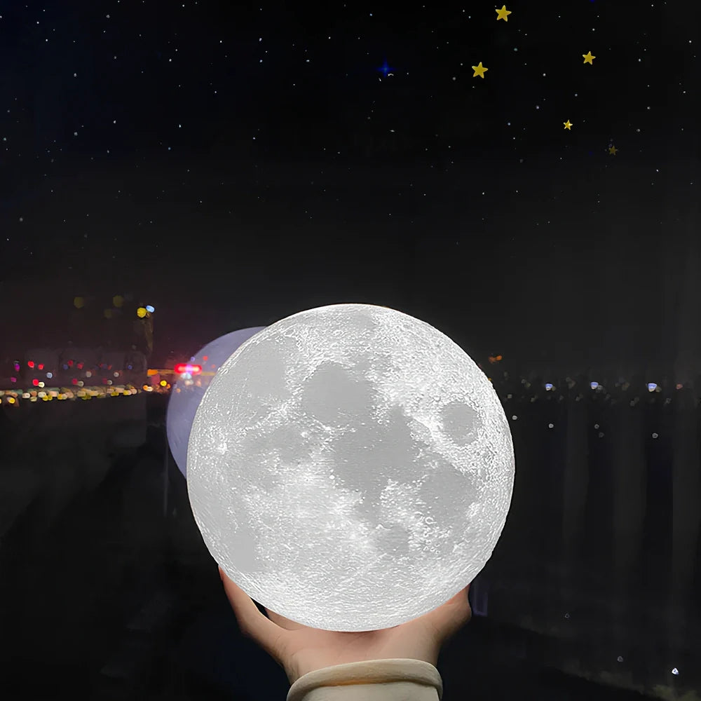 3D-printed moon night table lamp with remote control on wooden holder, showing lunar texture and adjustable brightness aperture