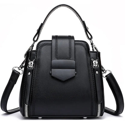 Soft PU leather ladies handbag with textured surface and sewing thread detailing in square vertical shape
