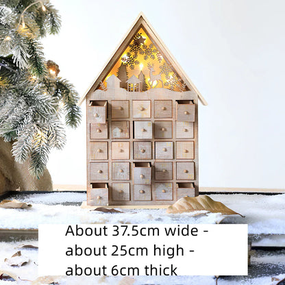 Wooden Christmas advent calendar with 24 numbered compartments in red and green colours measuring 37x32cm