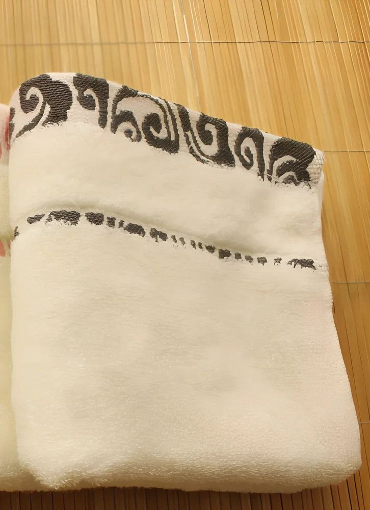 Pure cotton jacquard face towel measuring 33x73cm with textured patterns and twistless yarn construction