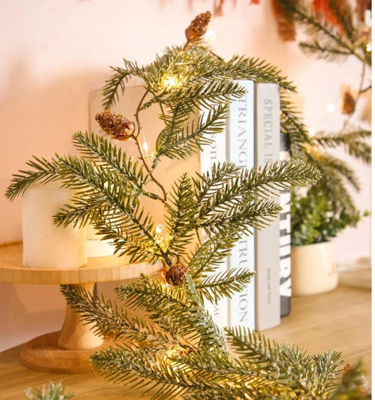 Festive rattan wall lights with LED pine needle-style lights for holiday decoration