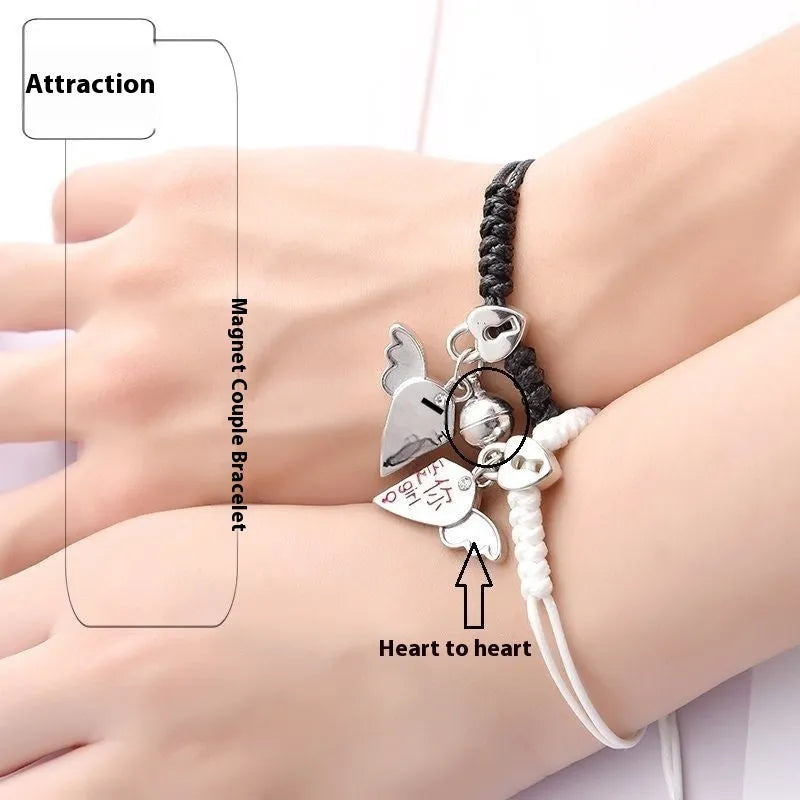 Magnetic suction couple bracelet pair in alloy with an electroplated finish, showing example designs like a crown and love lock.