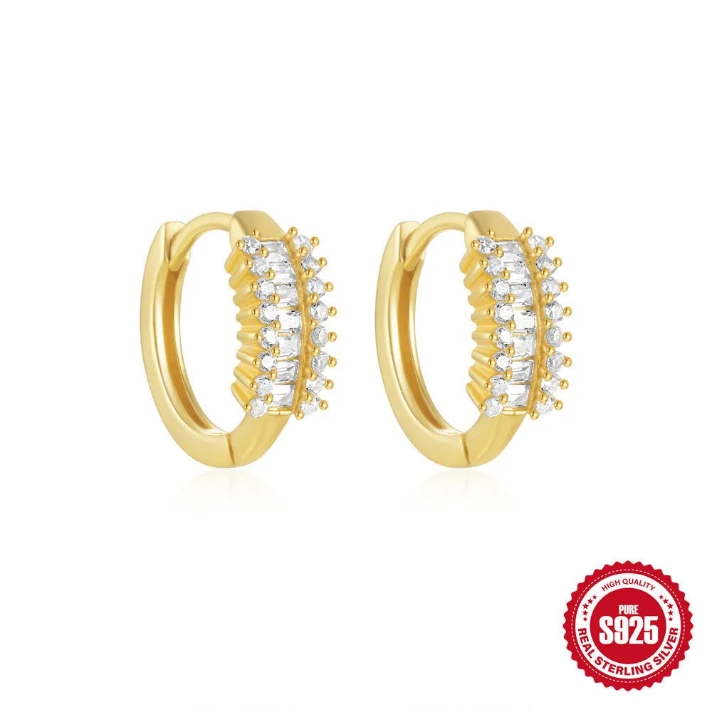 Sterling silver geometric stud earrings with small round diamond accents in gold or silver finish