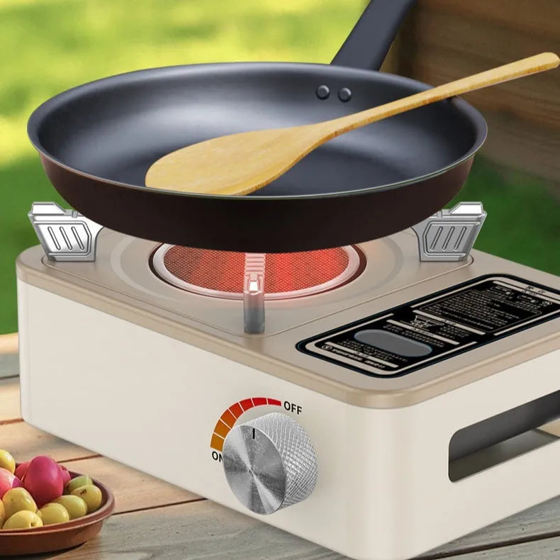 White stainless steel portable infrared gas stove for outdoor camping use.