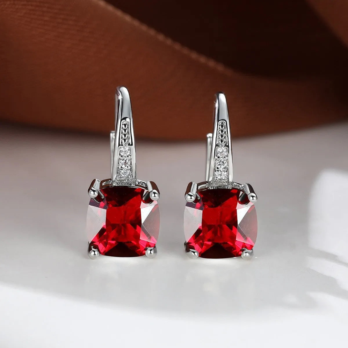 Square zircon inlaid ear hook earrings with geometric design and electroplated finish in golden tone