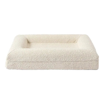 Beige rectangular cloth dog bed sofa nest with raised sides showing four size options