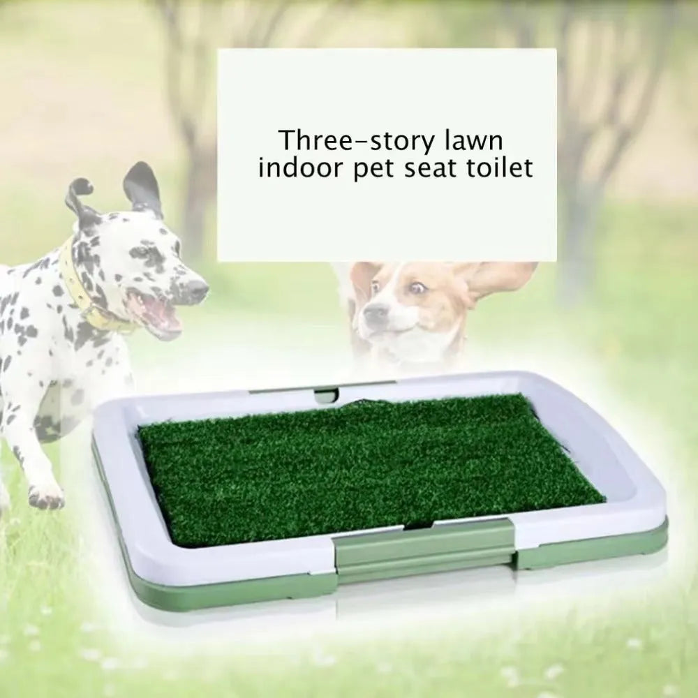 Green synthetic grass indoor dog toilet tray with plastic base for puppy training.