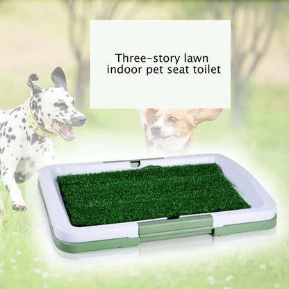 Green synthetic grass indoor dog toilet tray with plastic base for puppy training.