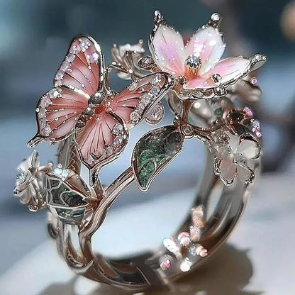 Adjustable crystal butterfly flower ring in gold, silver, and rose gold finishes