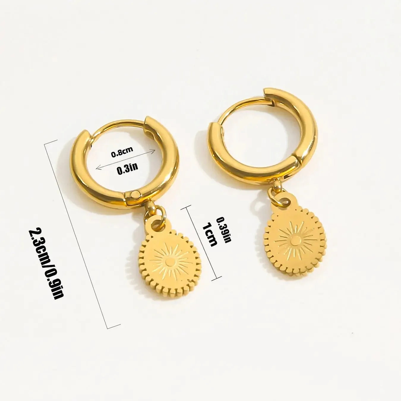 Geometric stainless steel earrings with ellipse design and ear button fastening, approximately 2-3cm diameter