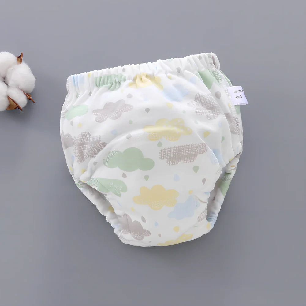 Washable baby training pants with 6-layer gauze construction in assorted patterns including animals and geometric designs