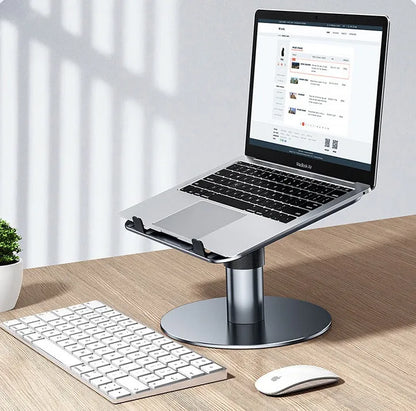Silver adjustable aluminium car laptop stand with rotating base shown holding a laptop