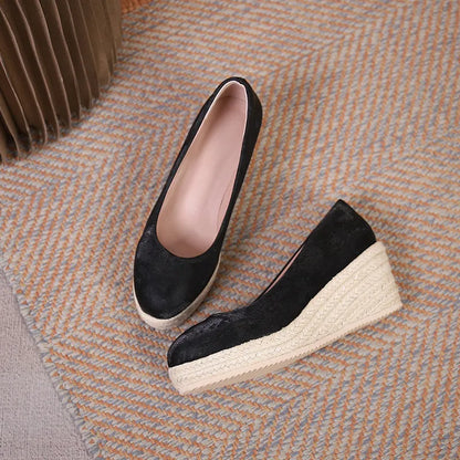 Women's wedge heel pumps with rope bottom detail in apricot colour with shallow mouth design