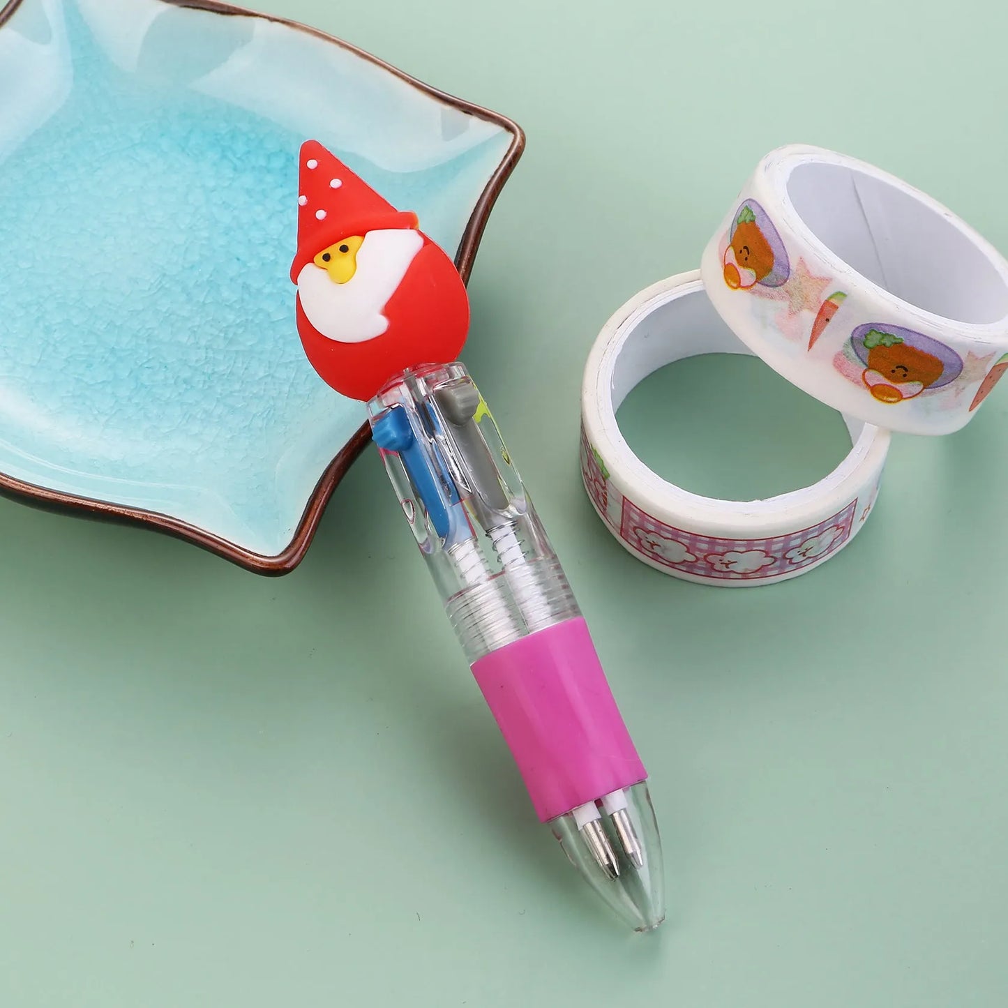 Christmas four-colour ballpoint pen with press mechanism showing festive designs