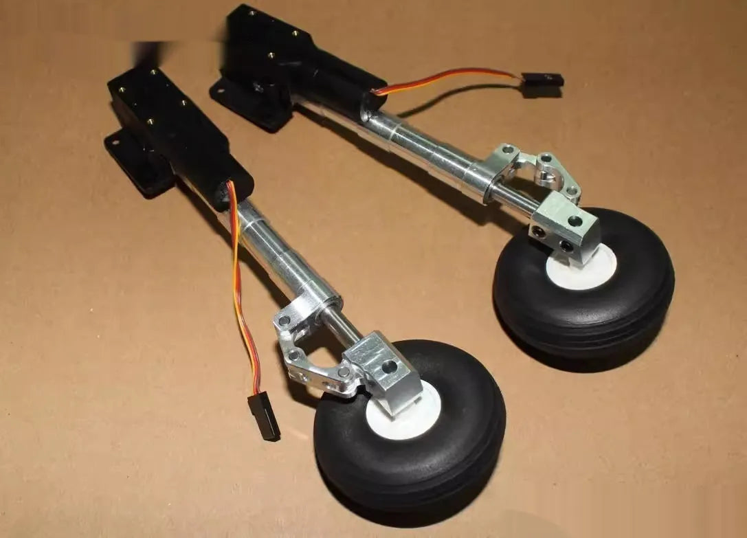 Retractable alloy landing gear for RC plane with shock absorber and large wheel.