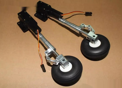 Retractable alloy landing gear for RC plane with shock absorber and large wheel.