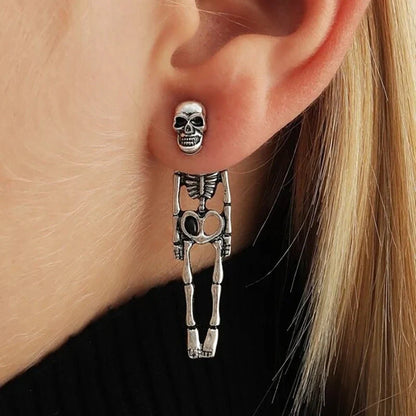 Halloween skull stud earrings in gold and silver, detailed design, lightweight alloy