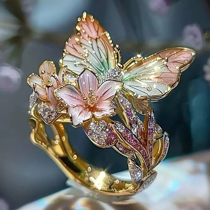 Adjustable crystal butterfly flower ring in gold, silver, and rose gold finishes